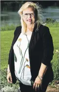  ?? CP PHOTO/NATHAN DENETTE ?? Jeannette VanderMare­l, co-founder of cannabis company The Green Organic Dutchman Holding Inc., poses for a photograph at her home in Ancaster, Ont., on June 1.