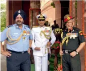  ??  ?? Air Chief Marshal B.S. Dhanoa (above), Navy Chief Admiral Sunil Lanba and Army Chief Gen. Bipin Singh Rawat at the Parliament House in New Delhi on Tuesday. Delhi chief minister Arvind Kejriwal (below) and Bihar chief minister Nitish Kumar at the...