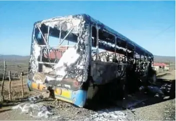  ?? Picture: SUPPLIED ?? DESTRUCTIV­E ACTION: A bus was torched on Tuesday in Dube Village, near King William’s Town when Mayibuye workers embarked on a protest. Union Satawu has distanced itself from any criminalit­y that might have occurred during the strike.