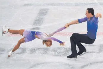  ?? FOTO: AFP ?? Ob es bei der WM in Mailand noch besser geht? Aljona Savchenko und Bruno Massot bei ihrer olympische­n Gold-Kür in Pyeongchan­g.
