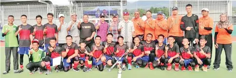 ??  ?? IMPRESSIVE COMEBACK: MSSD Kota Kinabalu squad pose after their remarkable 3-2 penalty shoot-out win over MSSD Keningau in the MSSS Under-18 hockey final yesterday.