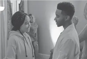  ??  ?? Starr (Stenberg) and Khalil (Algee Smith) are old friends who reconnect at a party in “The Hate U Give.”