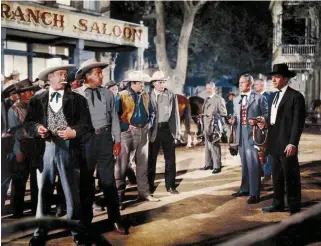  ??  ?? Burt Lancaster (right) stars as Wyatt Earp in the 1957 western Gunfight at the OK Corral. A biography of Earp published in 1931 made the shoot-out a household name