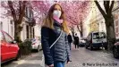  ??  ?? DW's Carla Bleiker during her masked visit to Bonn's cherry blossoms