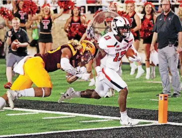  ?? [AP PHOTO] ?? Texas Tech’s Cameron Batson scores a touchdown in the Red Raiders’ win over Arizona State on Sept. 16 in Lubbock, Texas.