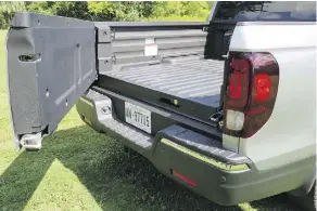  ?? JIL McINTOSH/DRIVING ?? The Honda Ridgeline features a tailgate that can be opened two ways and a lockable sealed trunk space under the bed.