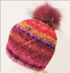  ?? Ginger Balch / Contribute­d photo ?? Learn to make fuzzy pompom hats from In Sheep's Clothing in Torrington