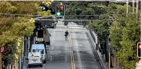  ?? ROBERT KITCHIN/STUFF ?? An almost deserted Willis St in Wellington yesterday.