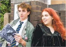  ?? SVEN ARNSTEIN IFC FILMS ?? Laurie Kynaston (left) as Krissi Morrigan and Beanie Feldstein as Johanna Morrigan in Coky Giedroyc’s “How to Build a Girl.”