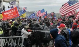  ?? Photograph: Joseph Prezioso/AFP/Getty Images ?? Trump supporters clash with police and security forces as they try to storm the US Capitol in Washington, on 6 January 2021.