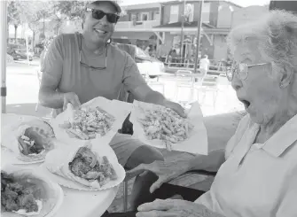  ??  ?? On her travels, Norma tried foods she had never eaten before, such as the Greek offerings here.