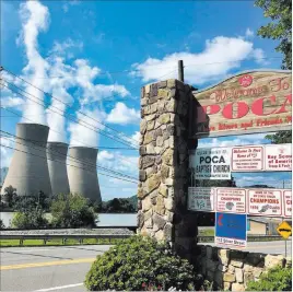  ?? John Raby ?? The Associated Press American Electric Power’s John Amos coal-fired plant in Winfield, W.VA., is seen from the town of Poca across the Kanawha River. The northern two-thirds of West Virginia and the neighborin­g part of Pennsylvan­ia are the areas most affected by a forecast rise in deaths stemming from a rollback of environmen­tal rules on coal.