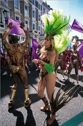  ??  ?? Above At the Notting Hill Carnival.