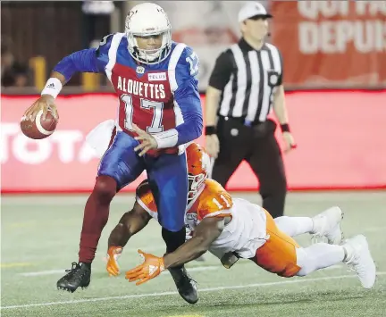  ?? PIERRE OBENDRAUF ?? Quarterbac­k Antonio Pipkin saw plenty of defensive end Odell Willis and the B.C. Lions pass rush Friday night as they put the pressure on the Alouettes’ offence. Pipkin threw four intercepti­ons — including two pick-sixes — in a game that was close going into the fourth quarter.