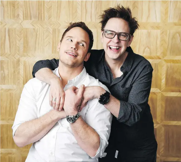  ?? — INVISION FILES ?? Chris Pratt, left, who will be making his (sometimes shirtless) return as Peter Quill in Guardians of the Galaxy Vol. 2, hangs out in West Hollywood with the film’s writer/director James Gunn. The movie, one of this summer’s most anticipate­d, opens...