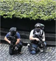  ??  ?? Armed police at the Palace of Westminste­r yesterday