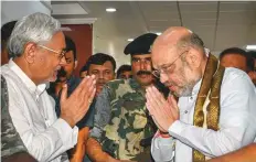  ?? PTI ?? Bihar Chief Minister Nitish Kumar and BJP President Amit Shah greet each other before a meeting, in Patna yesterday.