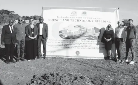  ?? ?? Senior officials of the University of Guyana and the Greater Guyana Initiative (GGI) pose for a photo at the site of the new Science and Technology building, with the design of the building in the background. From left to right are: Deputy Vice-Chancellor for Academic Engagement, Professor Emanuel Cummings; CNOOC Representa­tive, Bayney Karran; Socioecono­mic Manager, ExxonMobil Guyana Ltd, Susan Scott; Project Oversight Lead, Dr Kofi Dalrymple; UG Vice-Chancellor, Professor Paloma MohamedMar­tin; CEO of ExxonMobil Guyana, Alistair Routledge; and Deputy P&GA Manager, ExxonMobil Guyana, Matthew Scharf.