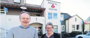  ?? PHOTO: PAUL TAYLOR ?? Health Care Home . . . Dr Simon Davies and nurse Judy Reid outside Queenstown Medical Centre.