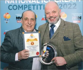  ?? ?? Alastair Dobson is presented with his lifetime achievemen­t award by celebrity chef Gennaro Contaldo.