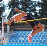  ?? — AFP ?? DAMASCUS: Syrian high jump player Majd Eddin Ghazal trains for the Tokyo 2020 Olympics in Tishreen Sports City in Damascus on June 30, 2021.