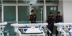  ?? Picture: AFP ?? PREPARED: Thai Police guard the hospital in Chiang Rai as rescue operations continue for 12 boys and their coach.