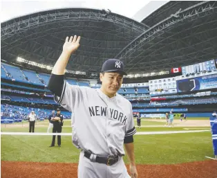  ?? COLE BURSTON/GETTY IMAGES ?? New York Yankees starter Masahiro Tanaka was masterful Sunday at the Rogers Centre, pitching eight-plus innings in a 1-0 victory over counterpar­t Trent Thornton and the Blue Jays in Toronto.