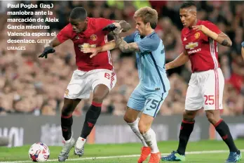  ?? UMAGES
GETTY ?? Paul Pogba (izq.) maniobra ante la marcación de Aleix García mientras Valencia espera el desenlace.