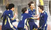  ?? MEG MCLAUGHLIN U-T ?? La Costa Canyon players celebrate the game’s only goal from Colin Yarbrough (right) vs. Steele Canyon.