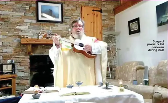  ??  ?? For the masses: Thousands haven been watching online
Songs of praise: Fr Pat performs during Mass