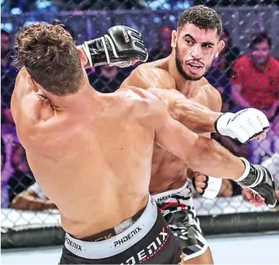  ?? MTK MMA Global ?? I started MMA classes when I was 15 in Tunisia. My parents decided to put me in a martial arts school to boost my confidence, because I was bullied, I was a skinny kid. Mounir Lazzez
Photo courtesy: