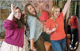  ?? BY MARK SCHAFER, STX FILMS] [PHOTO PROVIDED ?? From left, Aidy Bryant, Busy Philipps and Amy Schumer star in “I Feel Pretty.”