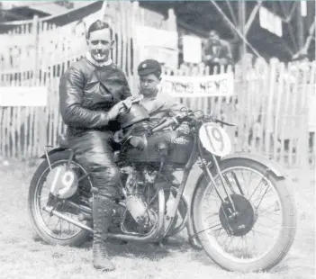  ??  ?? 1931. Father and a camera-shy son in the paddock after Graham won the 250cc class Isle of Man TT. Murray Walker was eight years old