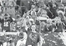  ?? TAMPA BAY TIMES ?? Tampa Bay Buccaneers quarterbac­k Tom Brady celebrates his victory in Super Bowl 55 against the Kansas City Chiefs on Feb. 7 in Tampa.
