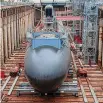  ?? Jessica Hill/Associated Press ?? Electric Boat workers ready the U.S.S. Illinois to be launched.