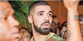  ?? [PHOTO BY RYAN EMBERLEY, INVISION/AP] ?? If the arrival of Drake’s big, fat “Scorpion” hints at anything meaningful, it might be the terminus of artist-asbrand, The Washington Post’s critic Chris Richards says.