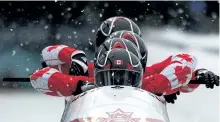  ?? LARRY WONG/POSTMEDIA NETWORK FILES ?? Lyndon Rush, Chris Le Bihan, David Bissett and Lascelles Brown compete in the Men’s Four-Man Bobsleigh event in February 2010, in Whistler, B.C., during the 2010 Olympic Winter Games.