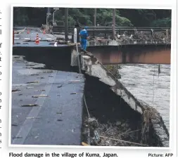  ?? Picture: AFP ?? Flood damage in the village of Kuma, Japan.