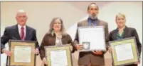  ?? DIGITAL FIRST MEDIA - SUBMITTED PHOTO ?? From left, new Alumni Honor Roll inductees James Bush, Therese Rinaldi, Jonathan Corson and Heather Thiret with their plaques.