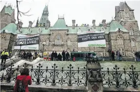  ?? JULIE OLIVER / POSTMEDIA NEWS FILES ?? Greenpeace protesters, pictured protesting in Ottawa in 2009, are not likely to be much happier about party positions a decade later.