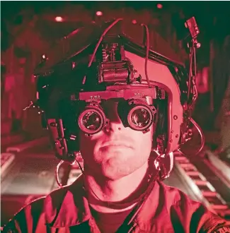  ?? CHRIS MCKEEN / FAIRFAXNZ ?? New night vision goggles give RNZAF crew a cutting edge way to show their skills in the dark.