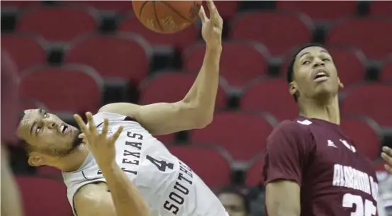  ?? Melissa Phillip / Houston Chronicle ?? Texas Southern University’s Jose Rodriguez tips the ball away from Alabama A&M’s Nicholas West during Wednesday’s game.