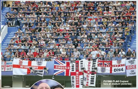  ??  ?? FLYING FLAG England fans at stadium yesterday