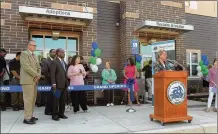  ?? KENT D. JOHNSON / AJC ?? DeKalb County Commission­er Kathy Gannon delivers remarks at the opening of the new animal shelter. The shelter is opening after years of complaints that cats and dogs were kept in poor conditions.