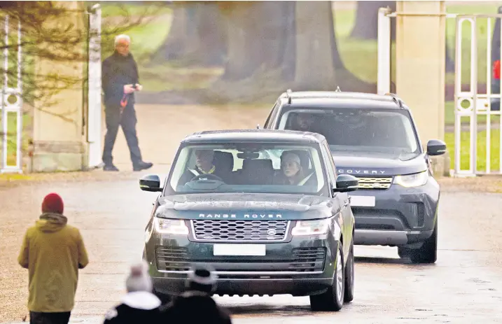  ?? ?? Prince Andrew and his former wife, Sarah, Duchess of York, drive from their residence in the grounds of Windsor Great Park yesterday