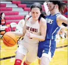  ??  ?? Senior Lady Blackhawk Aidan Dayberry (No. 5) was the second highest scorer with 10 points against the Lady Mounties Monday, Dec. 28, in Blackhawk gym.