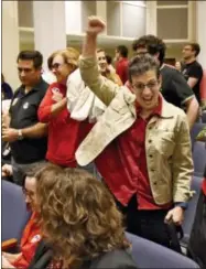  ?? THE ASSOCIATED PRESS ?? Gloria Perino celebrates after after the Jacksonvil­le City Council voted 12-6 to support the Human Rights Ordinance (HRO) in Jacksonvil­le, Fla.