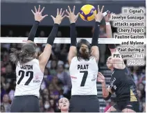  ?? TMT PHOTO ?? n Cignal’s Jovelyn Gonzaga attacks against Chery Tiggo’s Pauline Gaston and Mylene Paat during a PVL game.