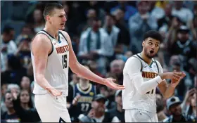  ?? (AP file photo) ?? Nikola Jokic (left) and Jamal Murray have led the Denver Nuggets into the NBA Western Conference finals for the first time since 2009. The Nuggets will be underdogs in the series against the Los Angeles Lakers, a role the team has relished this postseason.