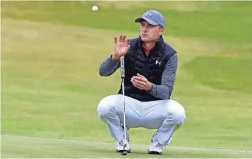  ?? IAN RUTHERFORD/USA TODAY SPORTS ?? Two-time major winner Jordan Spieth waits on the 14th green during his 5-under 65 in the first round of the British Open on Thursday at Royal Birkdale Golf Club.